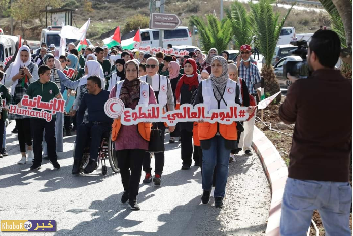 الهلال الأحمر الفلسطيني يحتفل باليوم العالمي لذوي الإعاقة، ويوم التطوع العالمي